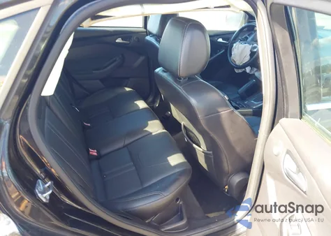 2014 Ford Focus Titanium из США, поврежденный, VIN 1FADP3J2XEL212933